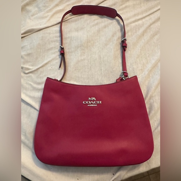 Coach Handbags - Small, pink Coach shoulder bag. Used once.